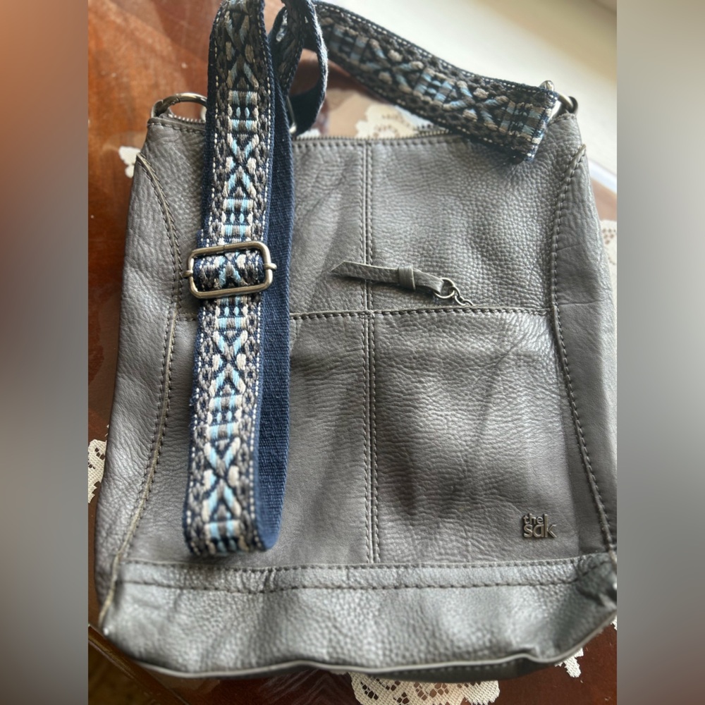 The Sak Gray Pebbled Leather Crossbody with Patterned Blue Strap
